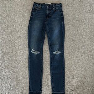 Women's Distressed Blue Jeans